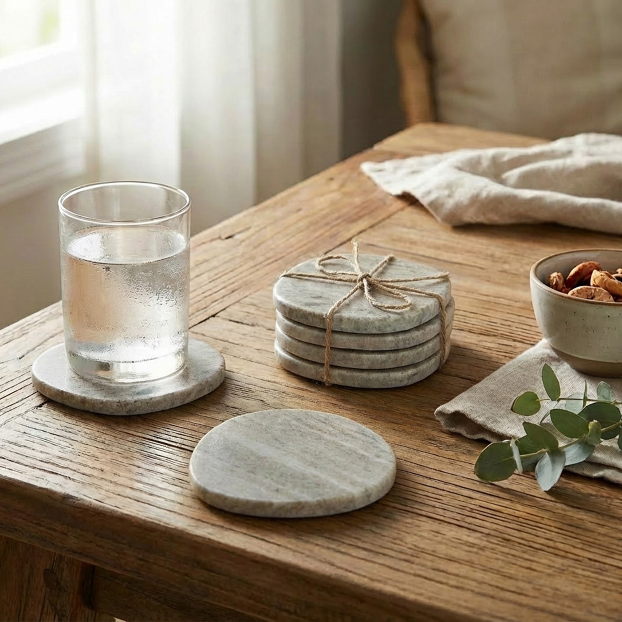 Set of 4 Beige Marble Pebble-Shaped Coasters, 4" Diameter