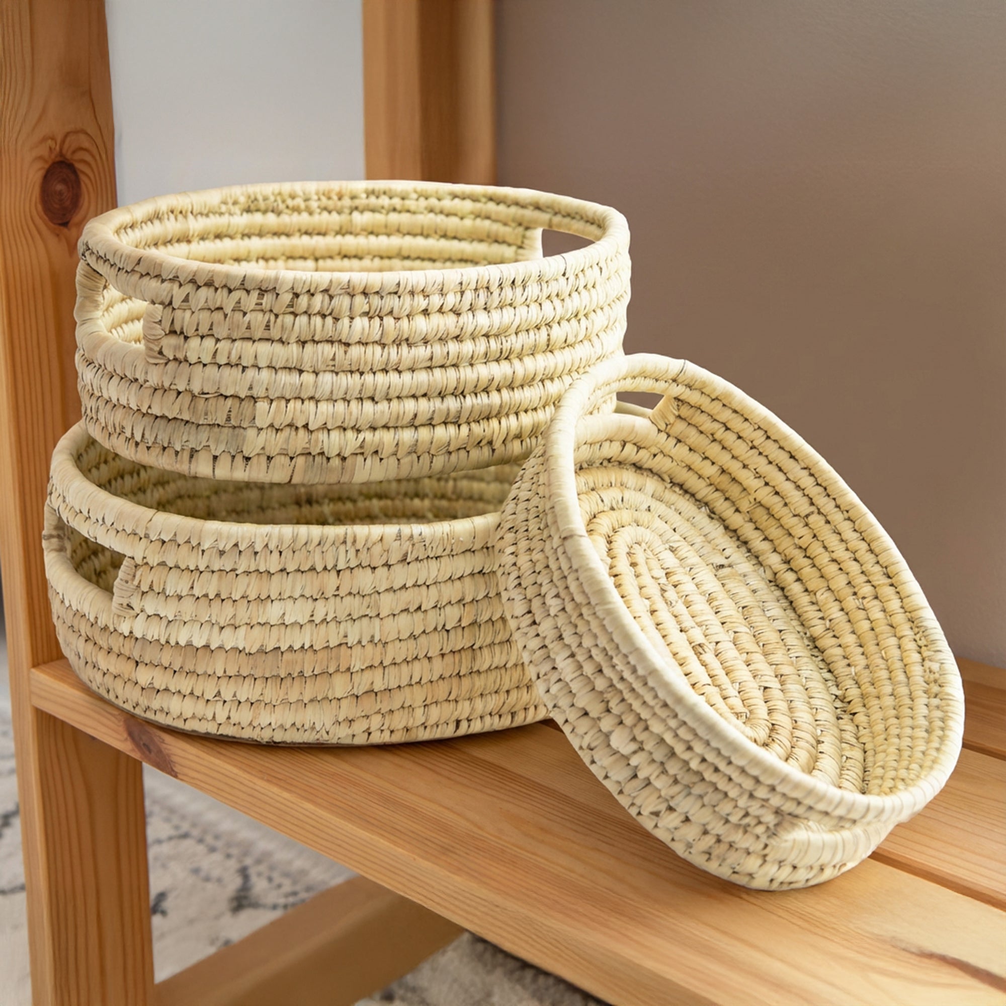 Set of 3 Oval Natural Grass Baskets with Practical Handles for Easy Carrying