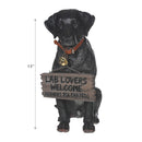 Black Labrador With Sign Bela